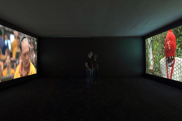 Mark Boulos, Two channel HD video projection, 15 min., All That is Solid Melts Into Air (Installation view), 2008