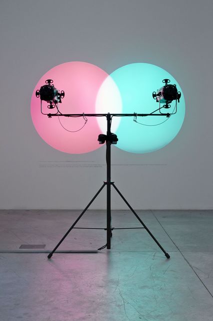 Amalia Pica, Spotlights on tripod, motion sensors, lighting gels, and graphite on wall, Venn diagrams (under the spotlight), 2011