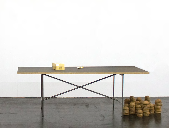 Peggy Franck, Table, coconuts, cornstarch, 18k gold plated sex toy, A herd of horses in the snowy snow and still the earth trembles..., 2013