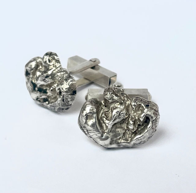 Dina Danish, Mixed Media, 925 Sterling Silver cufflink replica of Stone Age chewing gum 3500BC, original at National Museum of Finland, 2023